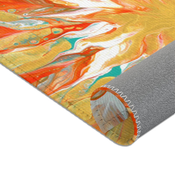 Orange and gold abstract art area rug backside closeup