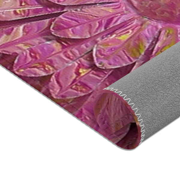 Pink flower area rug edge closeup