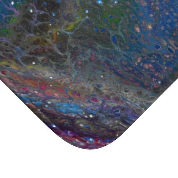 Blue galaxy bath mat corner closeup