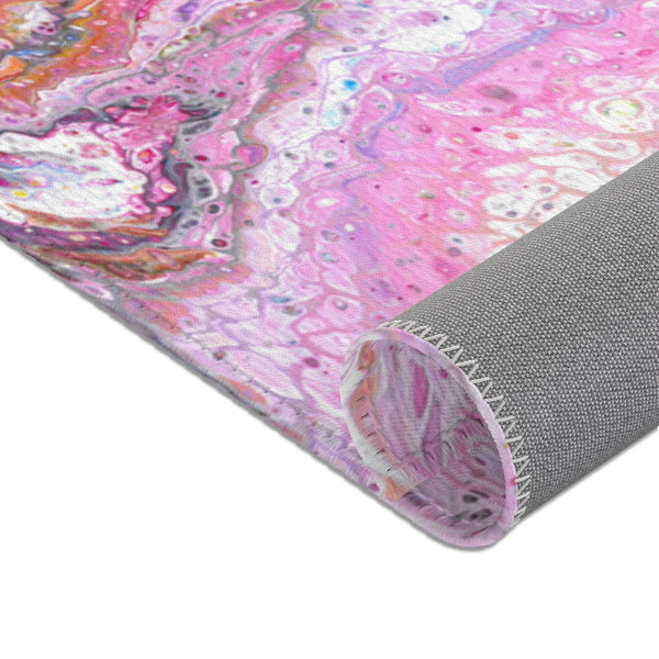 Pink galaxy abstract art area rug backside closeup