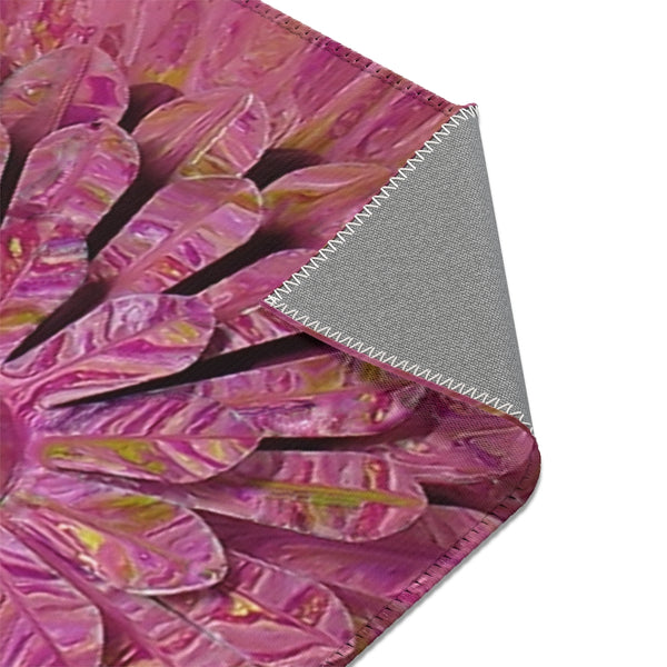 Pink flower area rug corner closeup